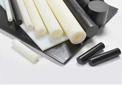 Variety of plastic rods in different materials and colors displayed for comparison