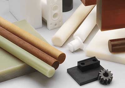 Different types of plastic rods including acetal, polypropylene, PTFE and more on display